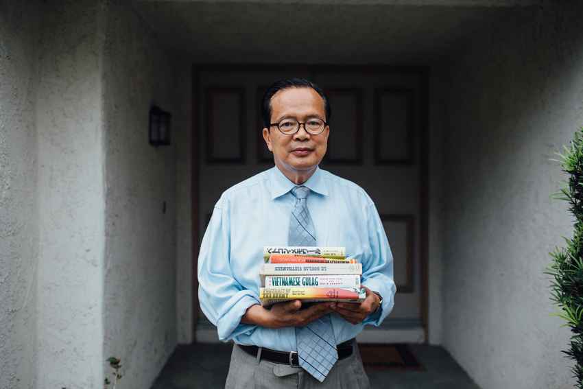 Ông Đoàn Văn Toại và tác phẩm của minh bên ngoài nhà của ông published books outside his home in Westminster, California October 27, 2015.