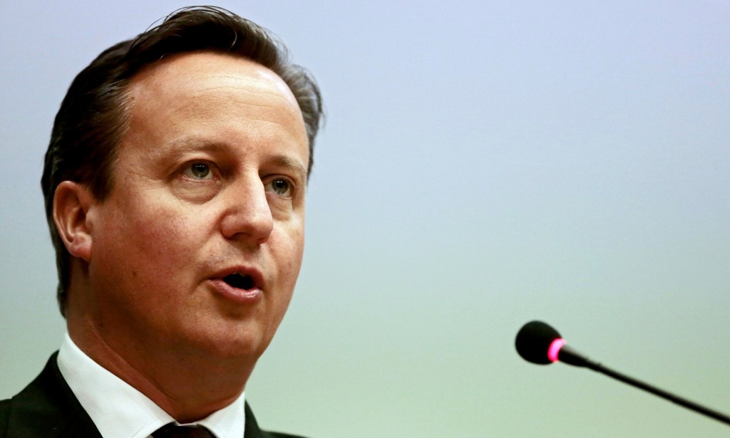 David Cameron đã hứa sẽ làm việc với Việt Nam để giải quyết các vấn đề chế độ nô lệ của con người. Ảnh: Wallace Woon / EPA